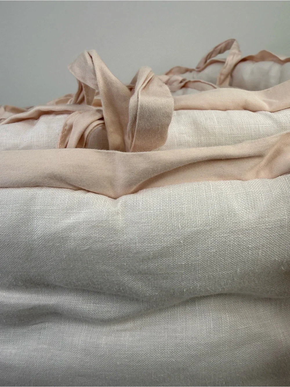 Pottery Barn kids bedding in blush pink.